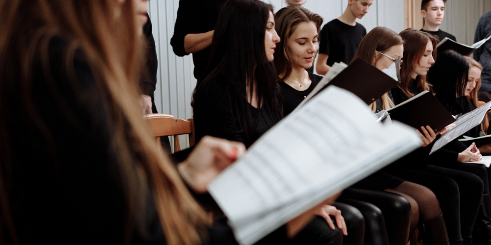 Scuola di canto mostrare coro voci